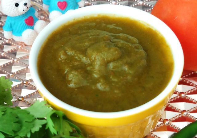 Tomato Basil ki Chutney in yellow bowl on copper color of tray.