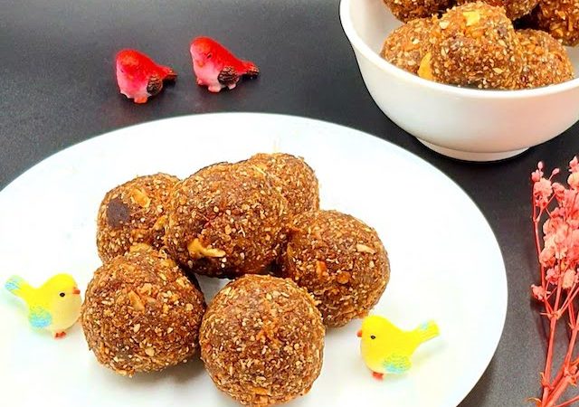 Til Ke Laddoo - Sweet Sesame Seed Balls on white plate.