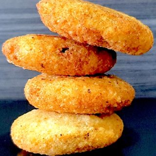 Sooji Matar Wali Kachori- A crispy Indian pastry filled with spicy green pea mixture.