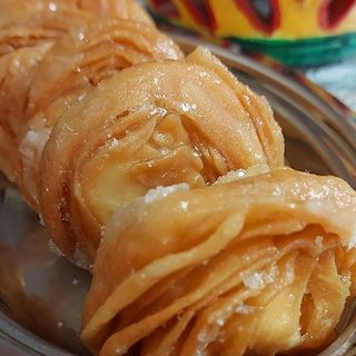 Delicious Pheni dessert on tray.