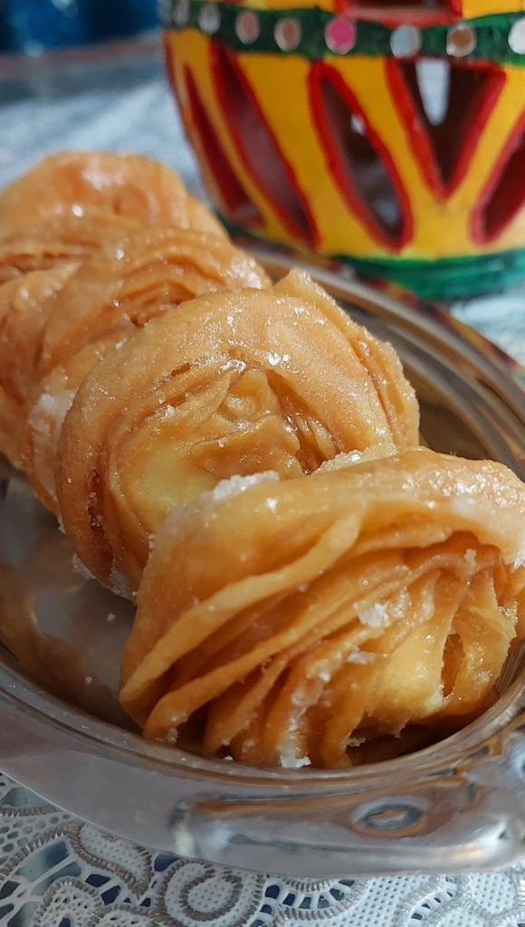 Delicious Pheni dessert on serving plate.